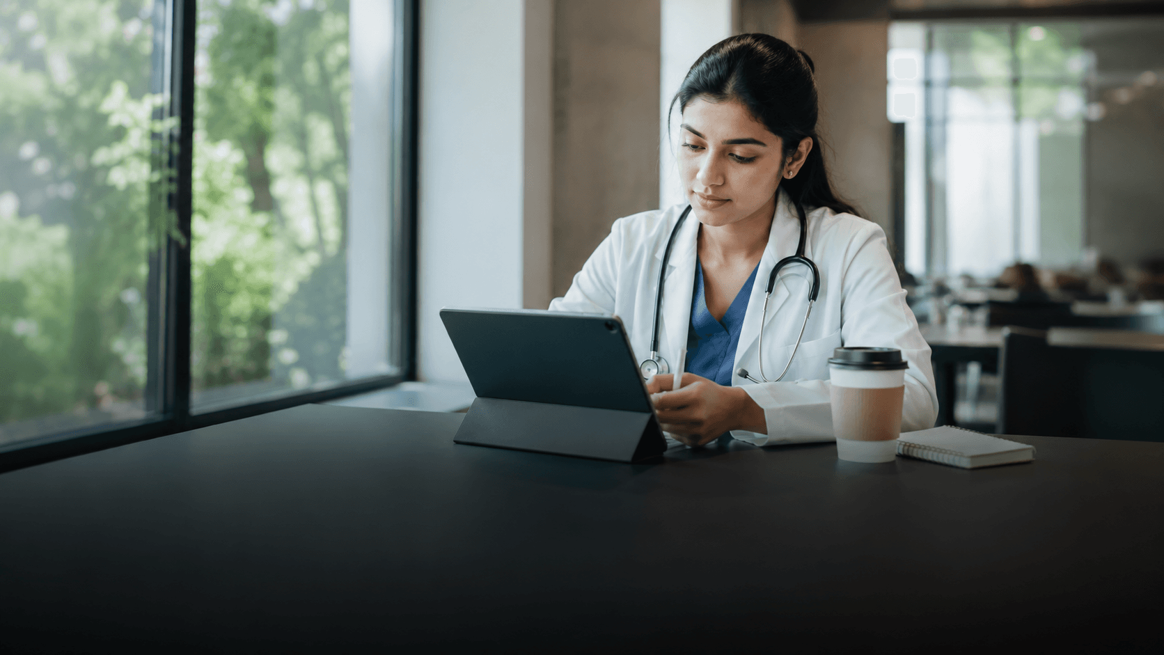 Medical student reading a MedEx book on a tablet with the digital library